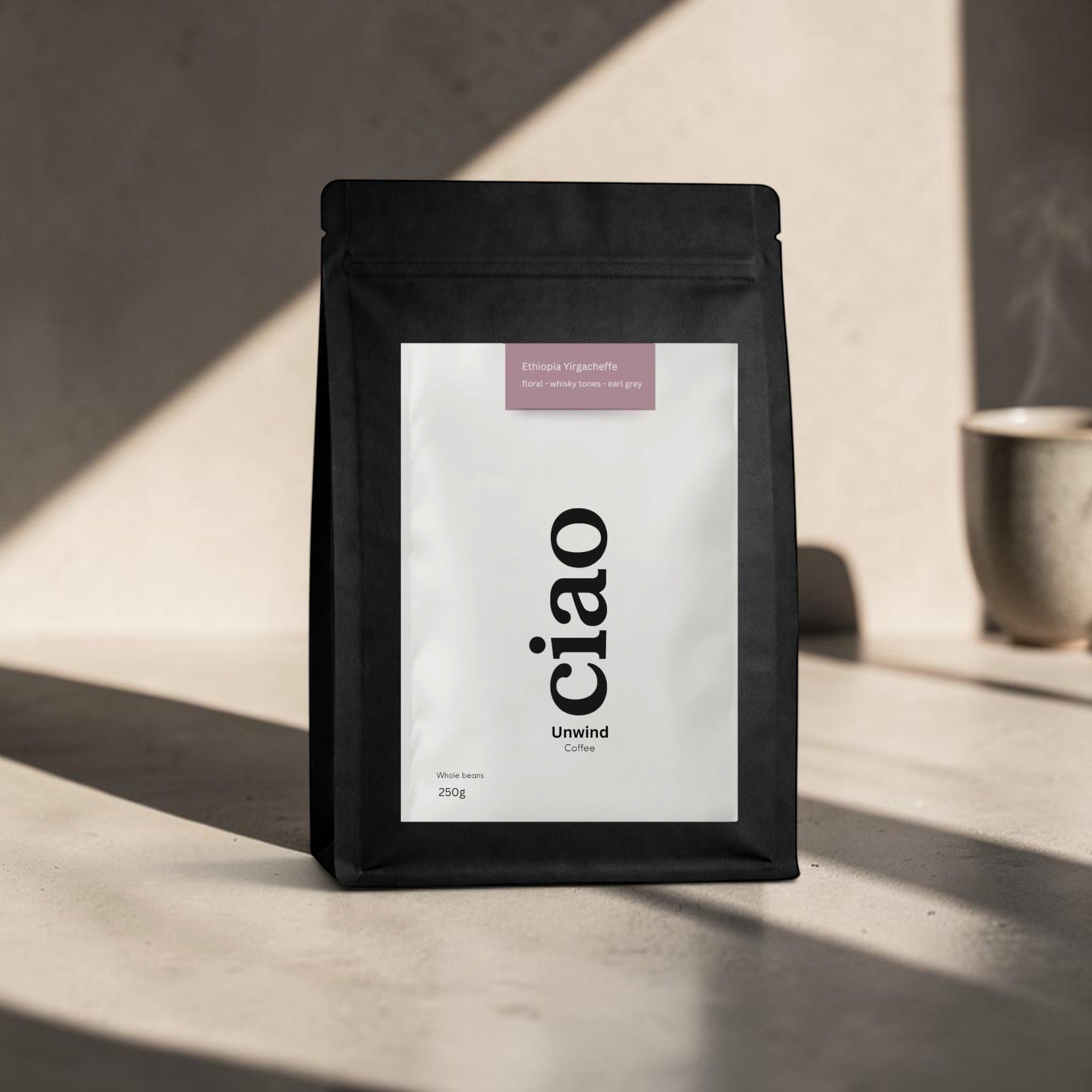 Say Ciao Coffee Unwind whole bean coffee bag from Ethiopia Yirgacheffe with floral, whisky, and Earl Grey notes.