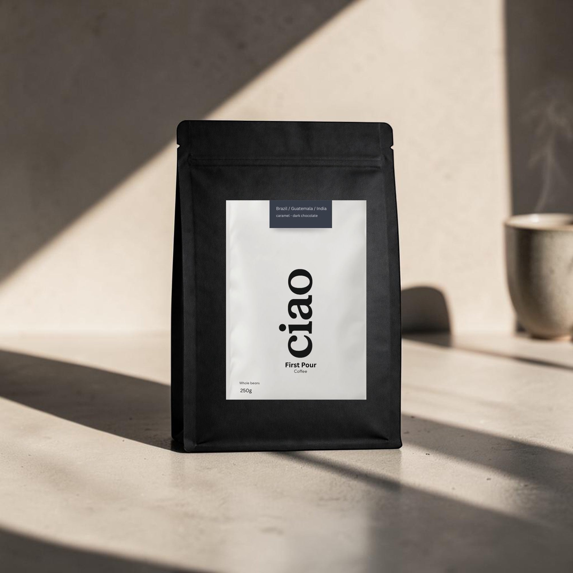 Say Ciao Coffee First Pour blend coffee bag, featuring tasting notes of caramel and dark chocolate.