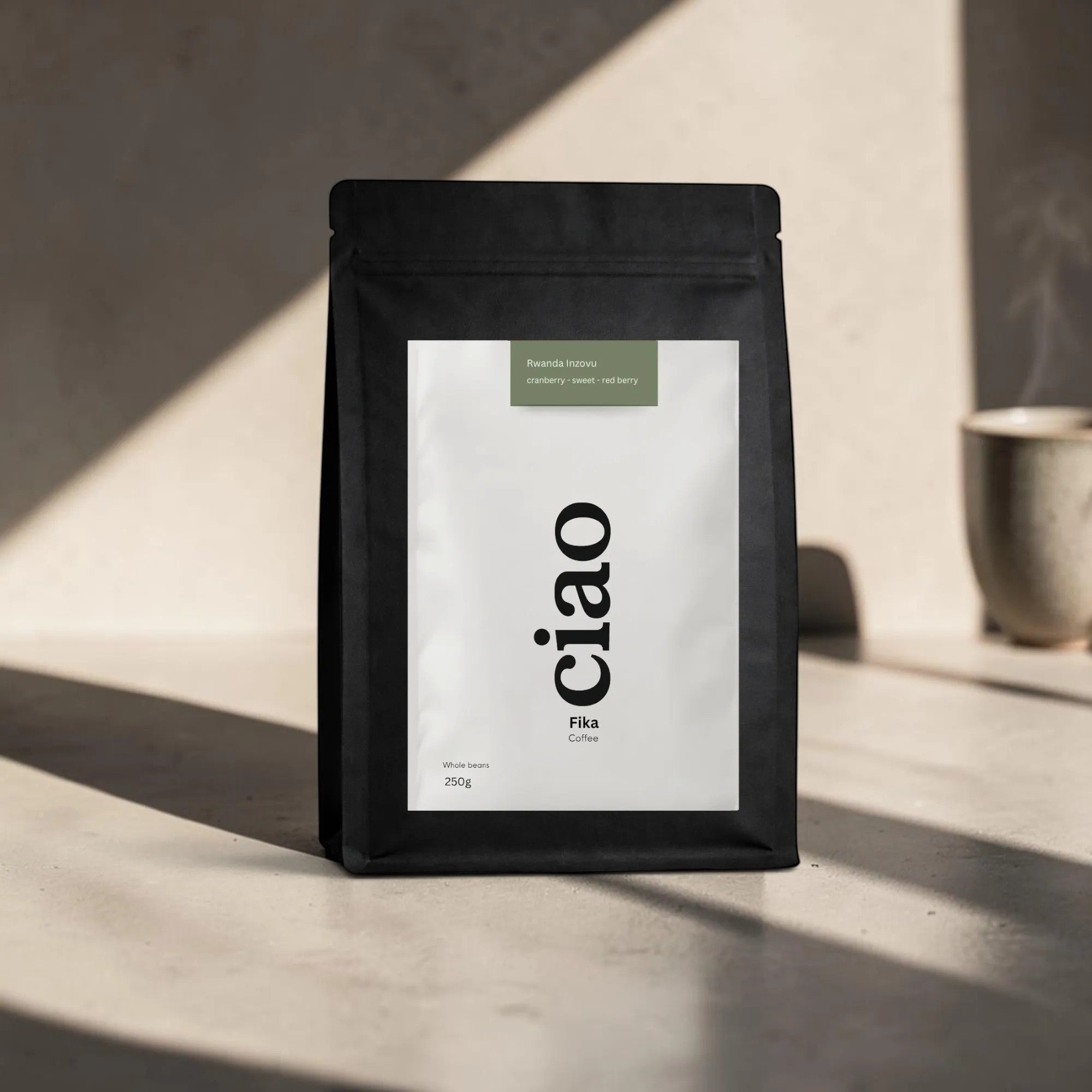 Say Ciao Coffee Fika whole bean coffee bag with tasting notes of cranberry, sweet, and red berry.