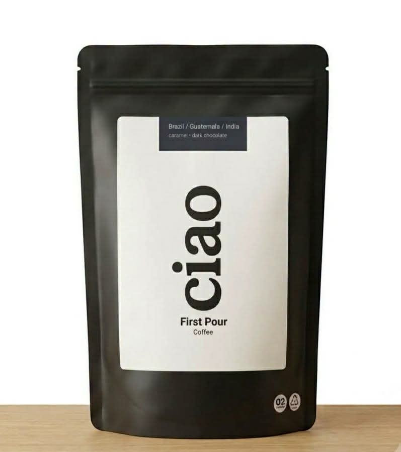 Say Ciao Coffee First Pour medium roast coffee beans in a black matte stand-up pouch with white label.
