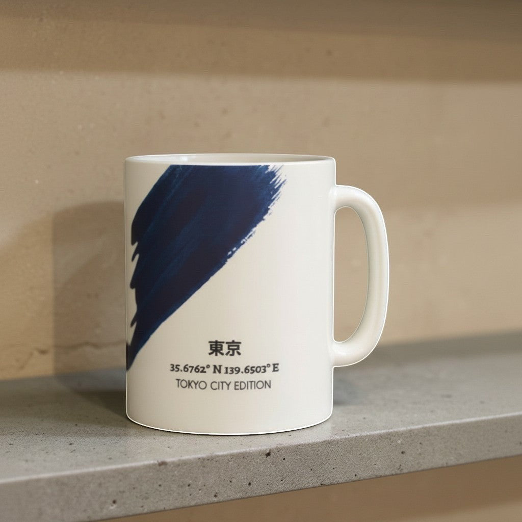 Say Ciao Coffee Tokyo Edition white ceramic mug with indigo brushstroke design and Tokyo coordinates.