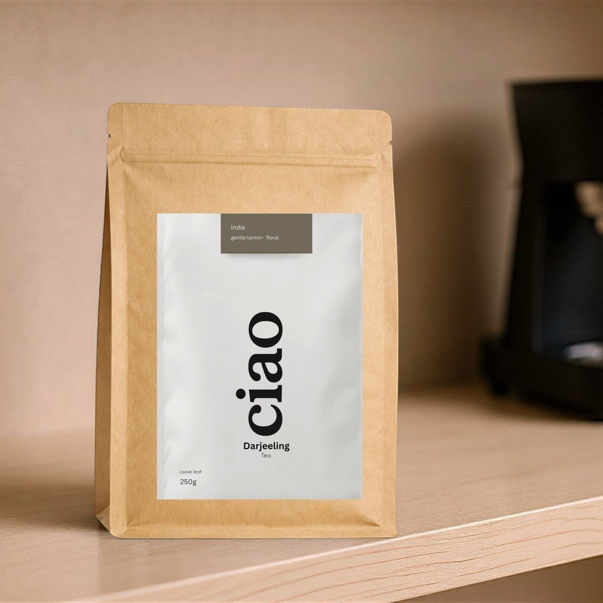 Say Ciao Coffee Darjeeling loose leaf tea in a brown paper bag with a white label. Floral and muscatel notes.