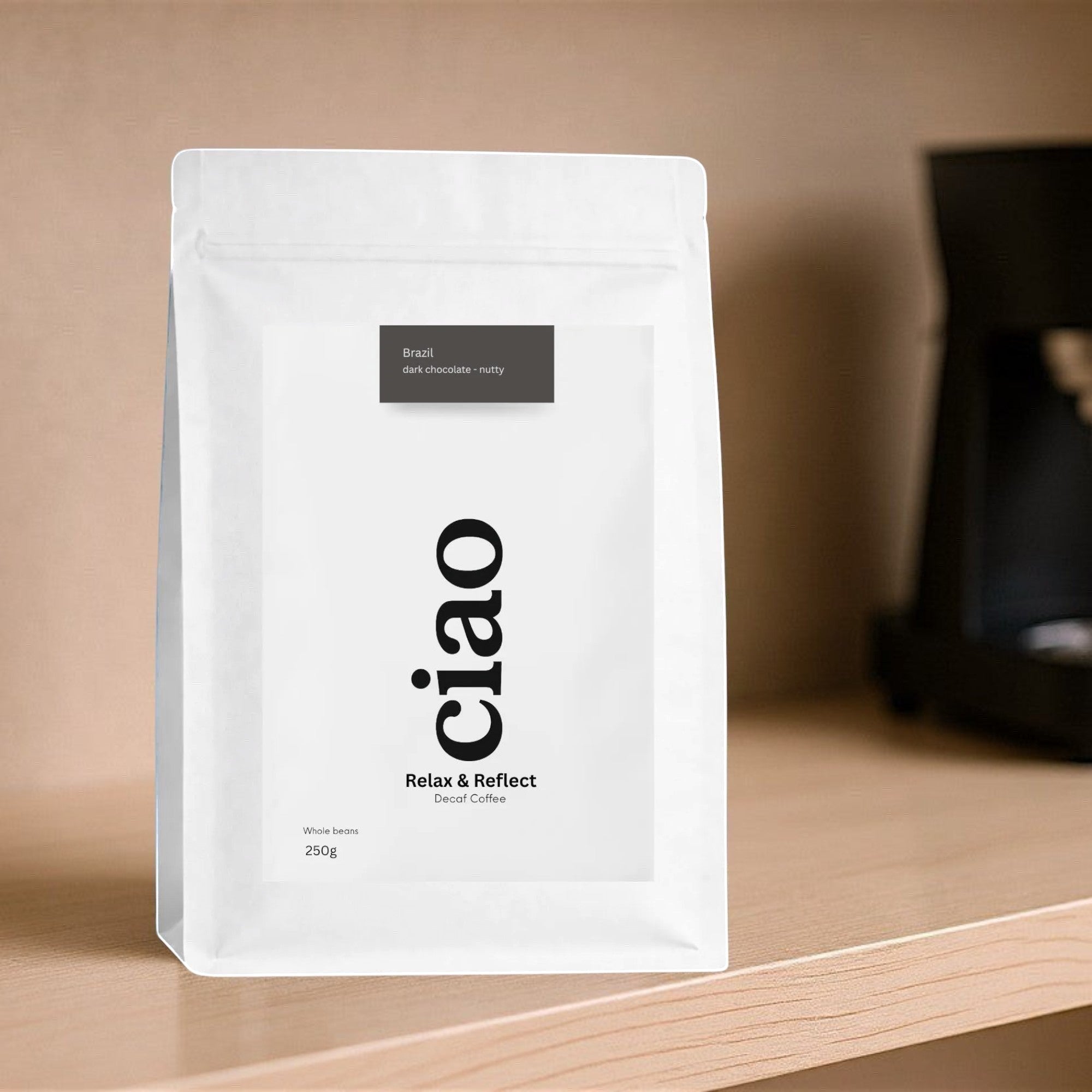 Say Ciao Coffee Relax & Reflect decaf coffee bag with tasting notes of chocolate, hazelnut, and caramel.